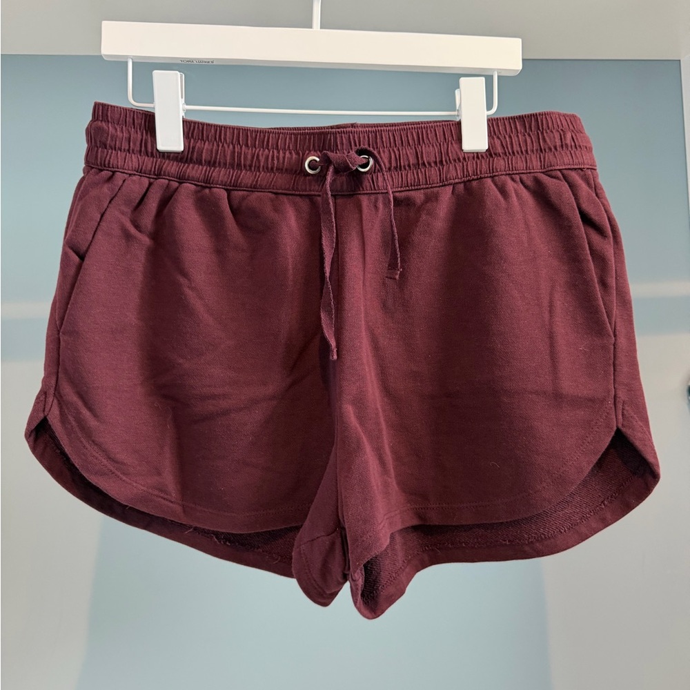 H&M Women's Athletic Shorts. Burgundy. Sz large. Elastic waistband w/tie detail.